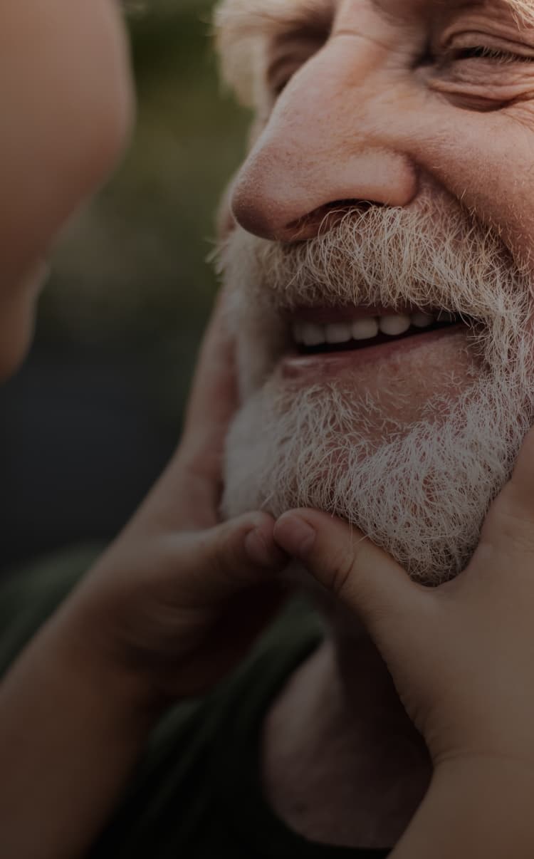 Man holding his grandson